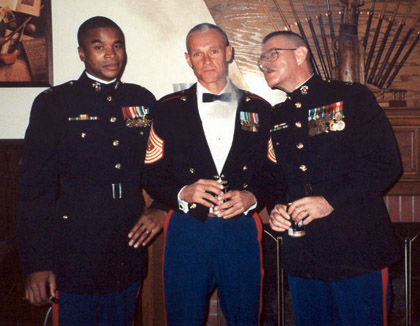 BACK WHEN -- Captains Riccoh Player (l) and John Dodd are shown<br /> celebrating the Corps' birthday with their mentor, Master Gunnery Sgt. Dave Marriott, at Camp Lejeune, circa 1997.  Player, now a lieutenant colonel, is the Senior Marine at Defense Information School.  His now-retired running mate, Dodd, teaches there also and both CCs hold the Master Instructor designation (an earned honor accorded only six current faculty members).  Dave Marriott is also retired and is PAOing at Cherry Point's Naval Aviation Depot.