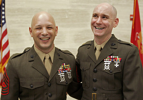 MSgt. Kyle Olson (l) with Major John Caldwell, Plans Officer, Division of Public Affairs.  Their former boss, MajGen. (s) Robert “Boomer” Milstead, now CG, Marine Corps Recruiting Command,  humorously made reference to the loss of one of two “biscuit heads.” 