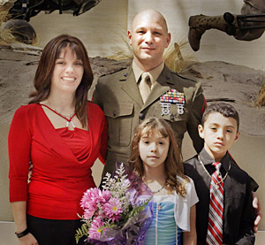 MSgt. Kyle Olson, retiring Plans Chief at DivPA, honored his wife, Silvana and their two children, for helping make his career a success.   