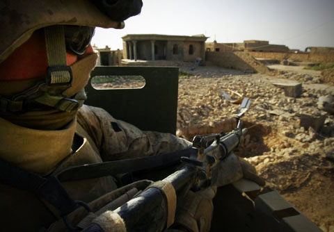 Returning member Marcus McAllister on duty in Iraq.