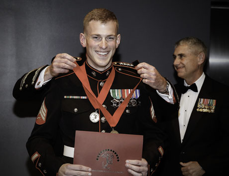 Sgt. Reece Lodder walked off with two first place wins, the Sgt. Maj. Bradley Kasal Award (photojournalism single) and the Gen. O.P. Smith Award (local reporting)in a recent Marine Corps Heritage Foundation awards competition. Presenting were: Gen. Walt Boomer, MCHF Board Chairman, SgtMaj Green, Gen. Dunford, LtGen Rusty Blackman, MCHF President.