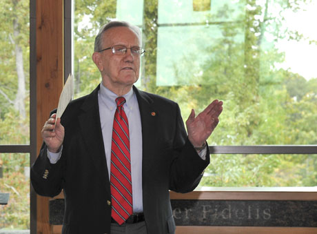 U.S. Marine Corps Col. Warren Weidhahn (Ret), Executive Vice President of the Iwo Jima Association of America, speaks to members of the U.S. Marine Corps Combat Correspondents Association during a plaque dedication ceremony for former Associated Press photographer, Joe Rosenthal. The ceremony was held on the 102nd anniversary of his birth, at the Semper Fidelis Memorial Chapel, National Museum of the Marine Corps, Triangle, Va., Oct. 9, 2013.  Rosenthal had a long career as a news photographer but his most iconic image was that of the flag raising when the Marines took Iwo Jima during World War II on Feb. 23, 1945, earning him a Pulitzer Prize. (U.S. Marine Corps photo by Kathy Reesey/Released)