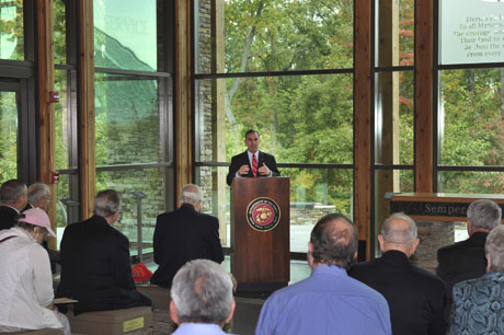 U.S. Marine Corps Lieutenant Gen. Jan Huly (Ret), speaks to members of the U.S. Marine Corps Combat Correspondents Association during a plaque dedication ceremony for former Associated Press photographer, Joe Rosenthal. The ceremony was held on the 102nd anniversary of his birth, at the Semper Fidelis Memorial Chapel, National Museum of the Marine Corps, Triangle, Va., Oct. 9, 2013.  Rosenthal had a long career as a news photographer but his most iconic image was that of the flag raising when the Marines took Iwo Jima during World War II on Feb. 23, 1945, earning him a Pulitzer Prize. (U.S. Marine Corps photo by Kathy Reesey/Released)